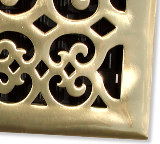 Victorian vent cover in cast polished brass closeup